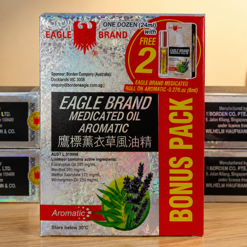 Eagle Brand White Medicated Oil value pack with 12 bottles of 24ml medicated oil and 2 roll-on bottles of 8ml for convenient soothing relief.