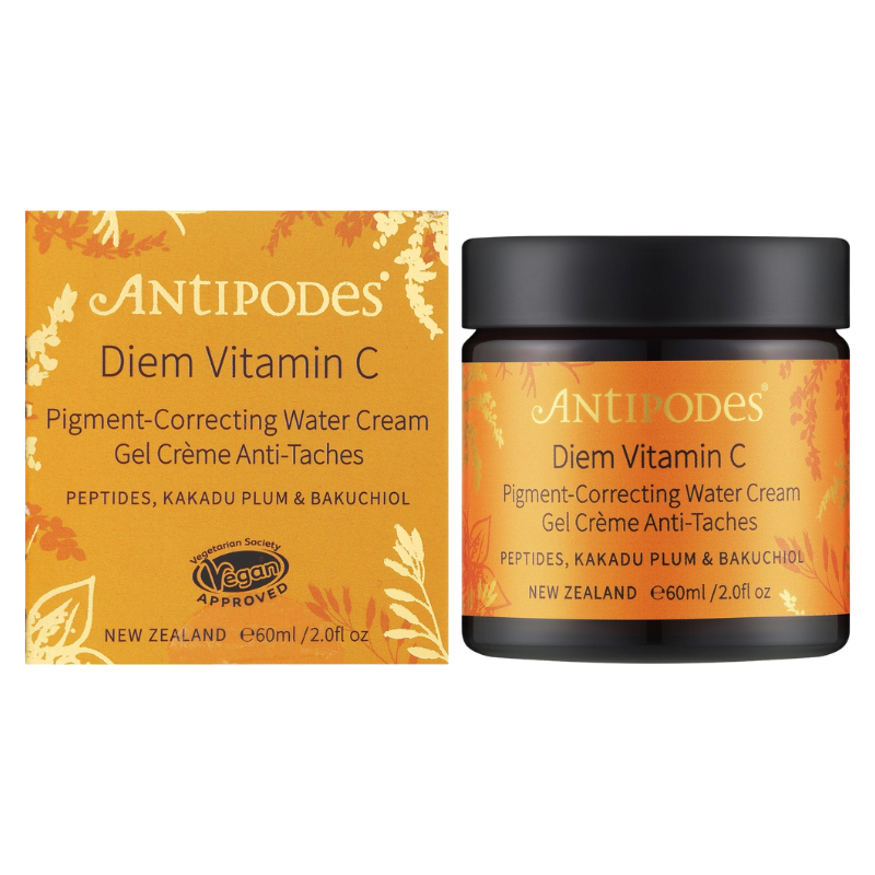 AntiPodes Diem Vitamin C Pigment-Correcting Water Cream shown as a black jar with an orange label next to its matching orange outer box on a white background.
