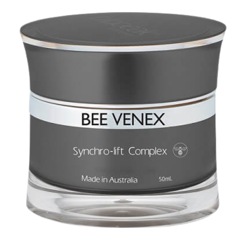 BEE VENEX Synchro-lift Complex skincare jar, 50mL, featuring a matte dark gray container with a clear glass base and a silver metallic band.