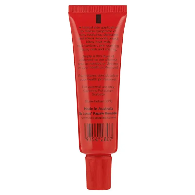 Red tube of skincare product on a white background