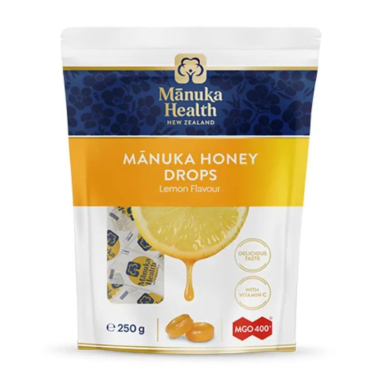 Manuka Health MGO 400+ Manuka Honey Drops Lemon 250g premium New Zealand lozenges with Manuka honey, lemon flavour, and vitamin C for throat comfort and freshness.