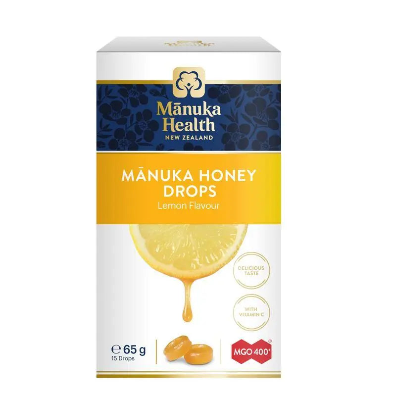 Manuka Health MGO 400+ Manuka Honey Drops Lemon 65g premium New Zealand lozenges with Manuka honey, lemon flavour, and vitamin C for throat soothing and freshness.