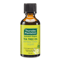 A 50 ml amber glass bottle of Thursday Plantation Tea Tree Oil Antibacterial Liquid with a black cap and a bright yellow-green label.
