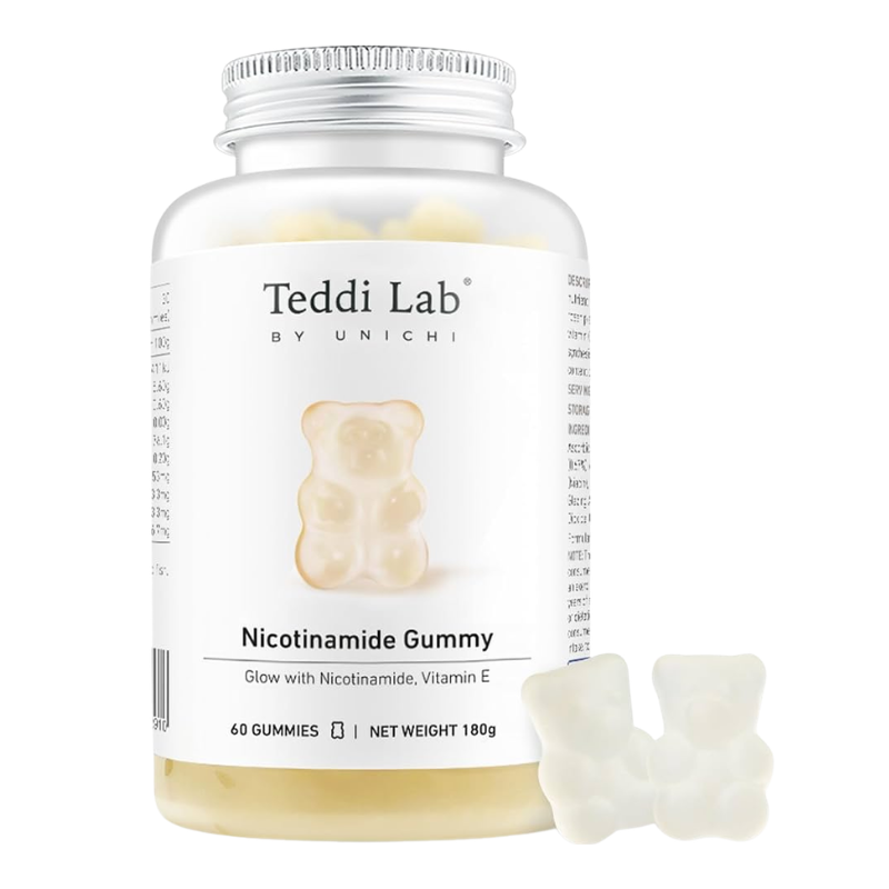 A bottle of Teddi Lab by Unichi Nicotinamide Gummy vitamins with a white label and silver cap, shown alongside three translucent off-white gummy bears on a clean white background.